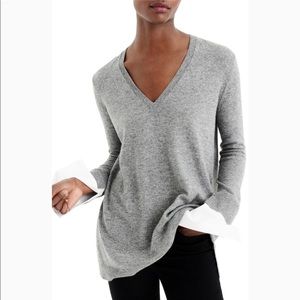 V-neck sweater with shirt cuffs